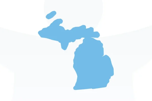 Blue silhouette of the state of Michigan, showing both the Upper and Lower Peninsulas on a white background.